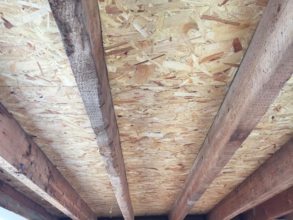underneath view of flat roof installation by d richards roofing
